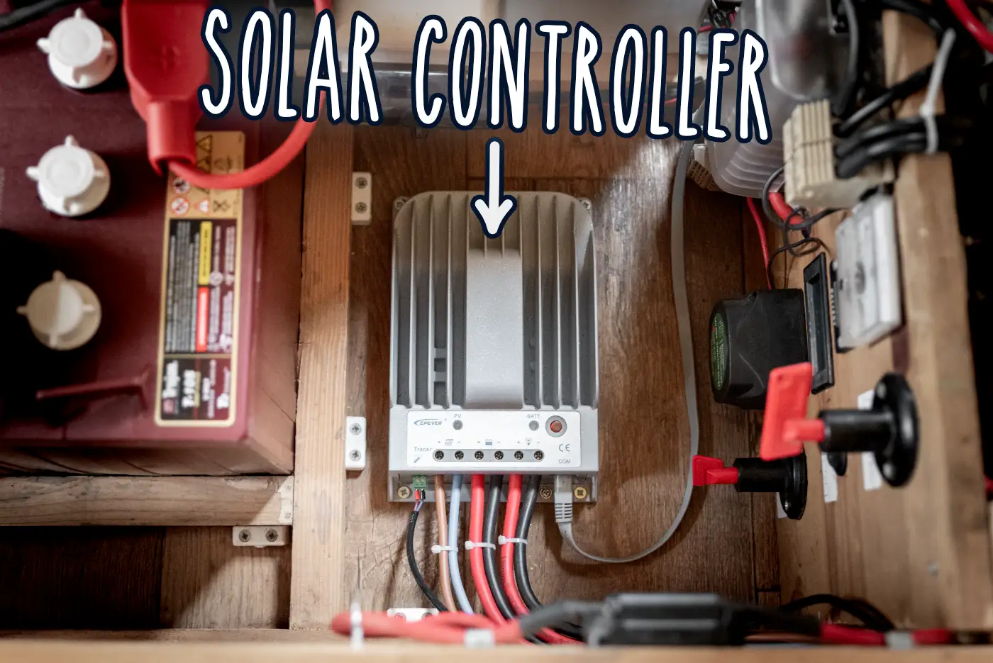 Electronics of a van conversion showing solar controller connected up