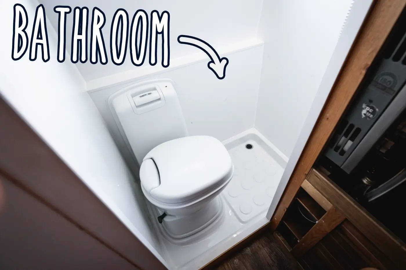 DIY camper bathroom with shower tray and toilet