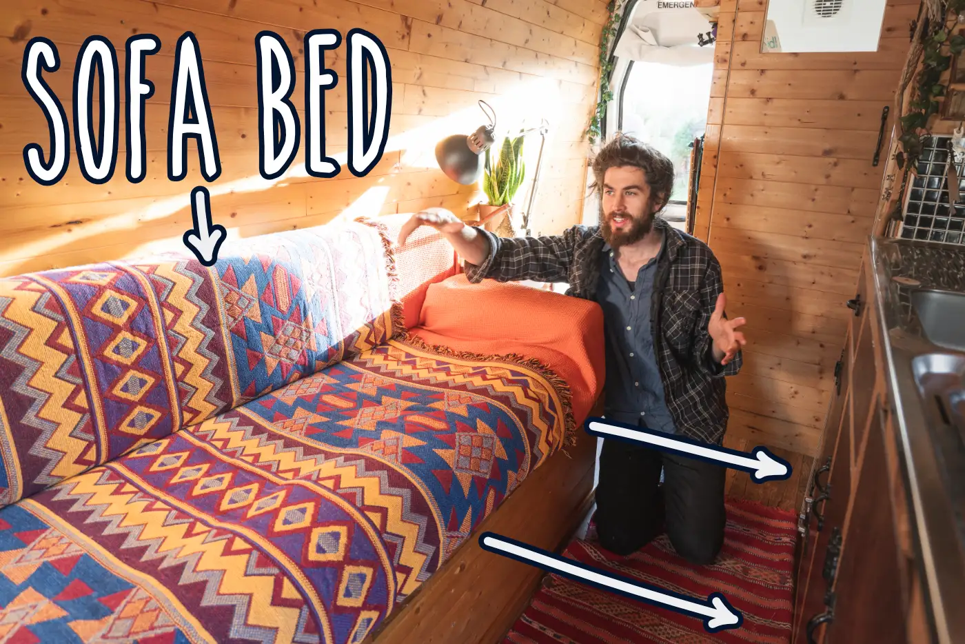 DIY campervan sofa bed with warm coloured decor