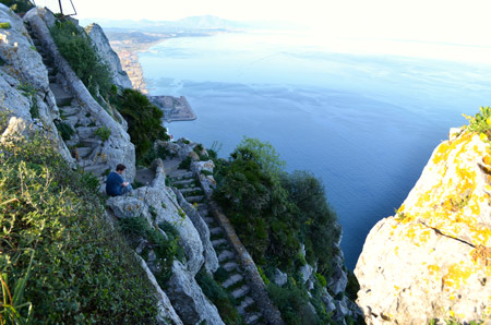 There is a kind of stepped path that takes you back down the other (East) side of the rock.